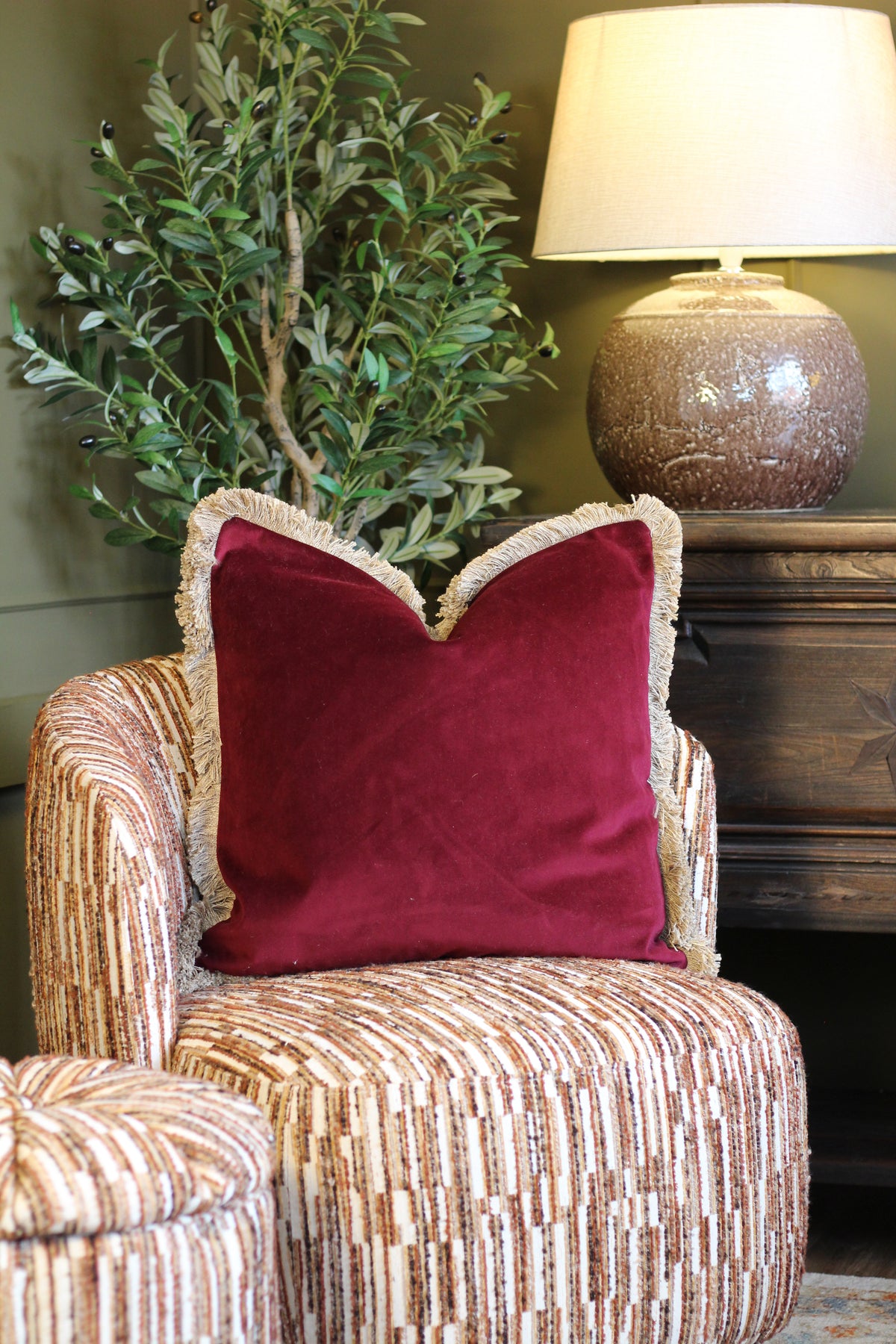Langford Claret fringed velvet cushion in a deep claret tone, 55 x 55cm