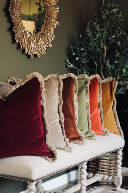 Langford Rust fringed velvet cushion in a warm rust tone, 55 x 55cm