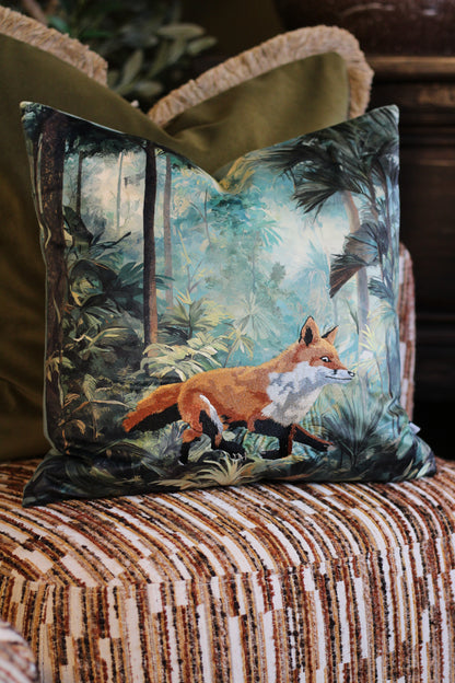 Bracken forest print cushion with embroidered fox styled on a brown striped chair
