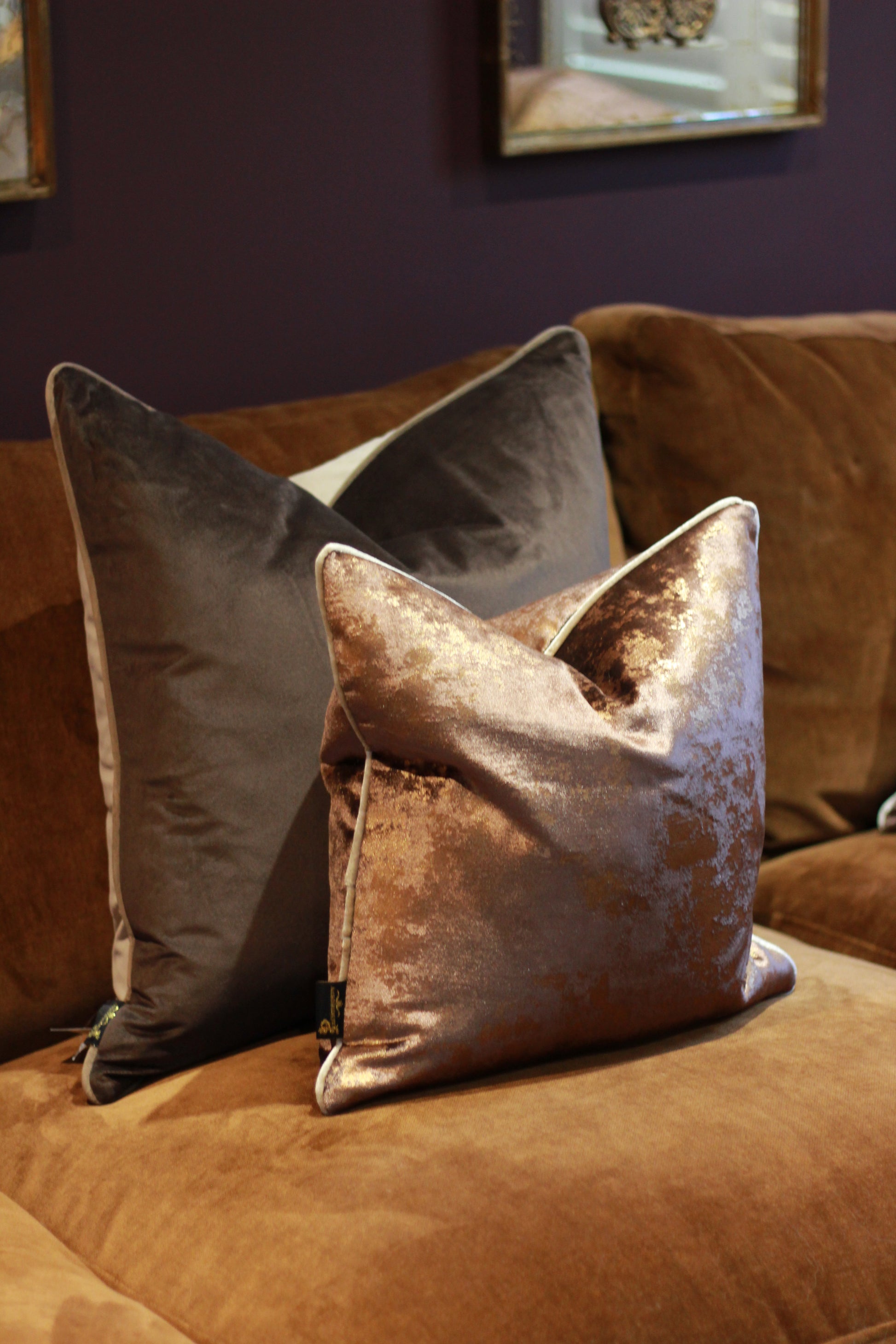 Close-up detail of brown and taupe velvet cushion